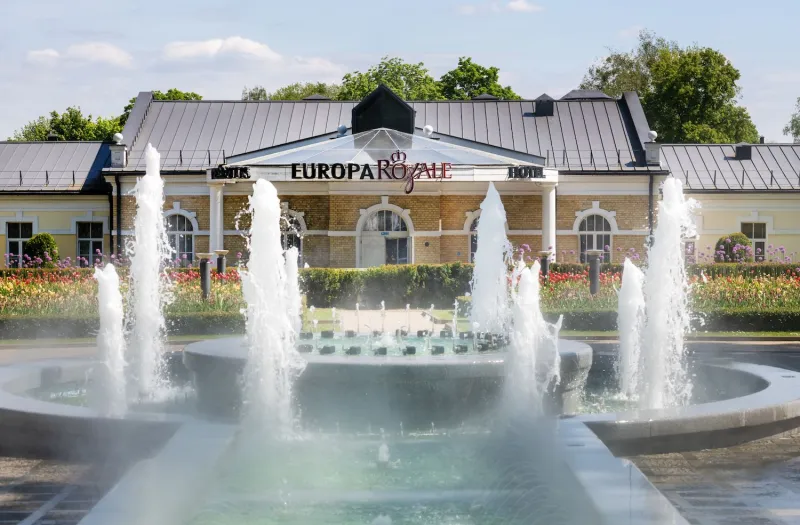 Fountain in front of the Europa Spa building on a summer day