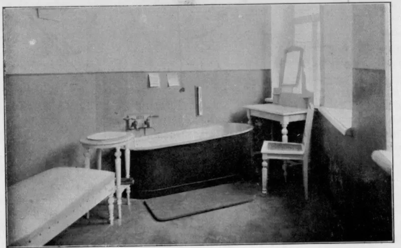 Archive photograph of a historic spa bathroom with a freestanding tub