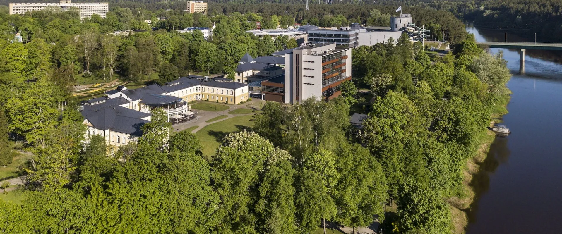 Aerial view of the hotel and its grounds on the bank of the Nemunas