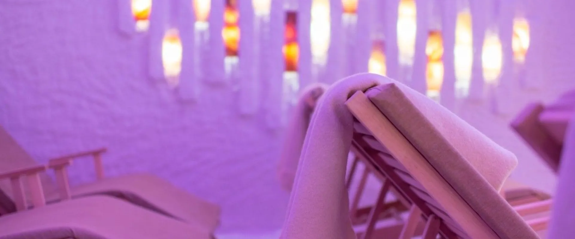 Salt room with reclining chairs and backlit salt panels